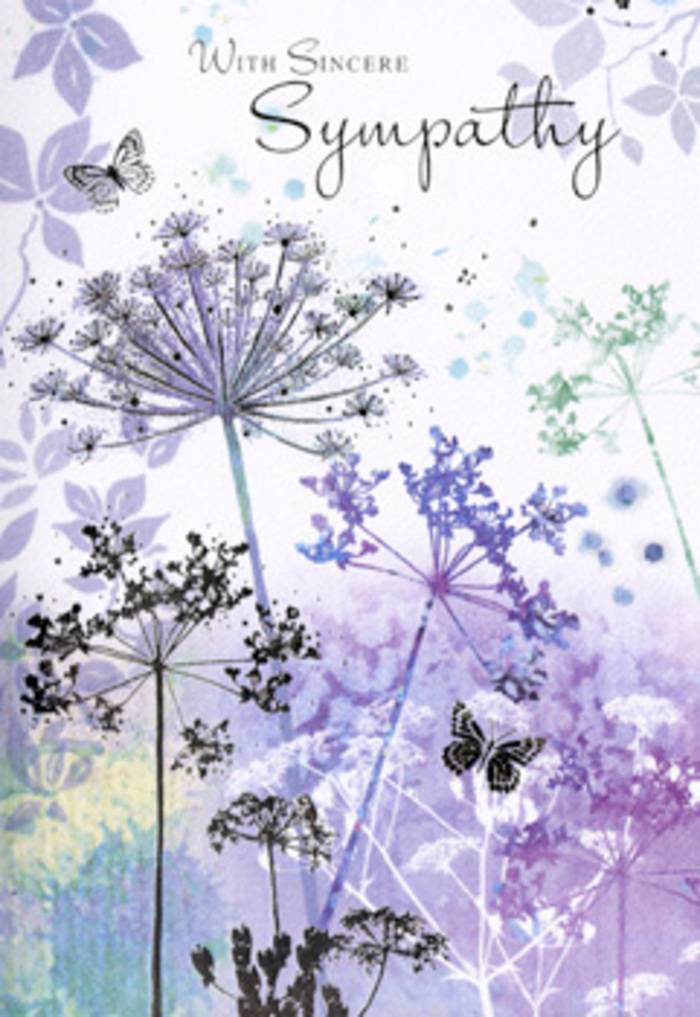 There is a tranquil, almost contemplative beauty in this sympathy card's illustration, which unfolds across the page in tall, wispy wildflowers and soft washes of colour. Slender stems rise in gentle arcs, some leaning slightly as if touched by a passing breeze, and at their tips rest filigree umbels made of countless delicate florets. These lace-like flower heads, tinted in shades of violet, lavender, and hints of soft blue, appear hand-drawn and then softened with watercolour, capturing the fragile endurance of wildflowers you might glimpse along a quiet path near Keston's wooded edges. Behind them, the background blurs into a mist of violet, powder blue, and tender greens, like the diffused light on a dewy morning when the village is just waking and everything feels hushed. Two or three butterflies hover above the feathery petals, their wings semi-transparent and finely suggested, symbolising hope, continuity, and the gentle presence of something beyond our everyday sight. The lighting is diffuse and forgiving, without sharp shadows or high contrast, creating a cocoon of calm and reflection. There is a sense of openness-plenty of breathing room between stems, blooms, and butterflies-so the scene never feels crowded or overpowering. As a florist working in Keston, I'm reminded of the care that goes into crafting a sympathy arrangement that speaks softly yet meaningfully. This card, with its cool, comforting palette and tender floral imagery, invites the sender and recipient alike to pause, breathe, and remember, offering more than just a message-it offers a quiet, nature-wrapped moment of shared understanding.
